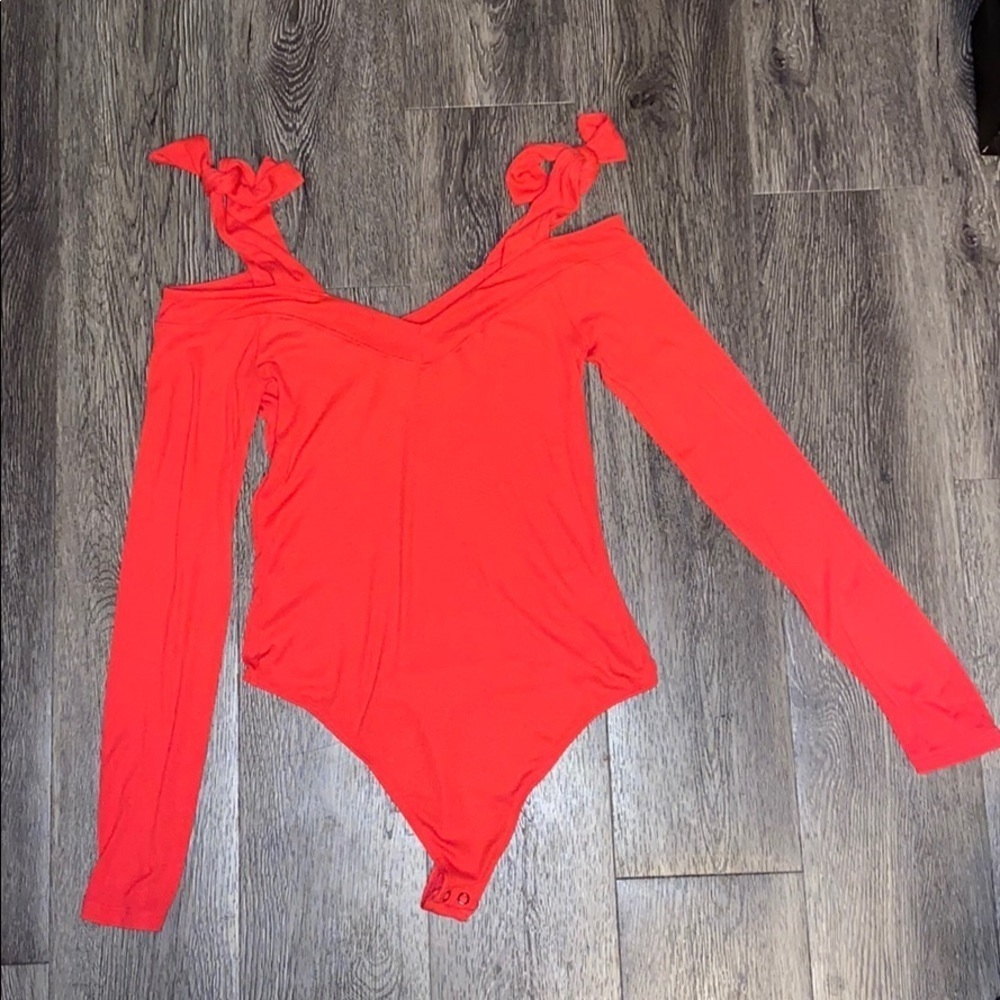 Red open shoulder bodysuit
